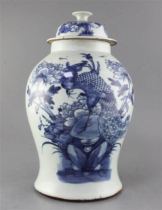A Chinese blue and white phoenix and peony vase and cover, 19th century, height 43cm